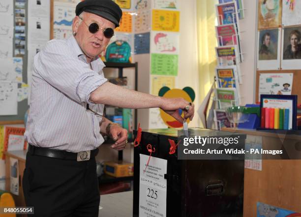 King of Tory, artist and Musician, Patsy Dan Mac Ruari votes in the EU Fiscal treaty referendum at the Pooling Station based in the St Colm cillie...