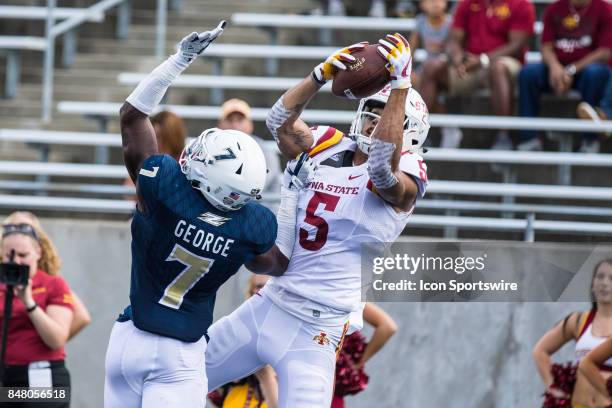 Iowa State Cyclones wide receiver Allen Lazard makes a 7-yard touchdown catch over Akron Zips defensive back Jordan George during the first quarter...