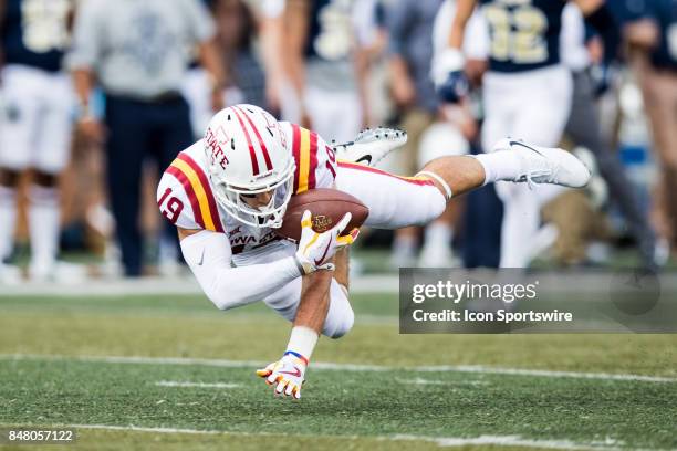 Iowa State Cyclones wide receiver Trever Ryen makes an acrobatic diving catch during the first quarter of the college football game between the Iowa...