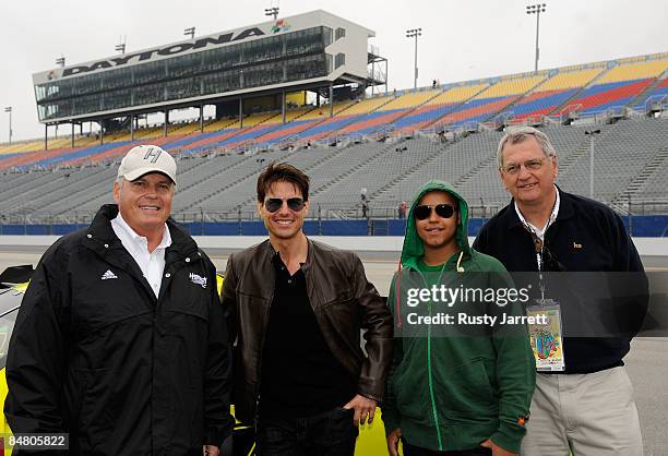 Team Owner Rick Hendrick, poses with actor Tom Cruise with his son Connor Antony and father-in-law Martin Joseph Holmes in front of the pace car...