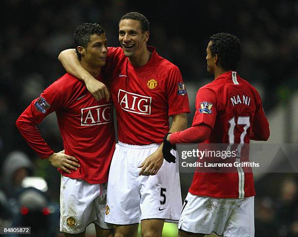 Cristiano Ronaldo of Manchester United is congratulated by Rio Ferdinand and Nani after scoring the third goal during the FA Cup sponsored by E.on...