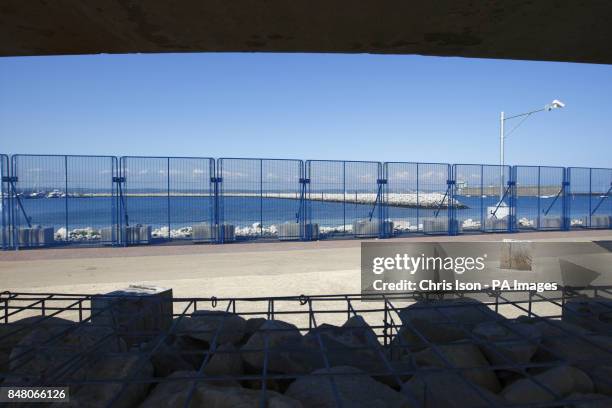 General view of security fencing being erected around the Weymouth and Portland National Sailing Academy.