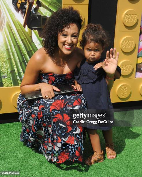 Tamera Mowry-Housley and daughter Ariah Talea Housley arrive at the premiere of Warner Bros. Pictures' "The LEGO Ninjago Movie" at Regency Village...