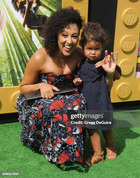 Tamera Mowry-Housley and daughter Ariah Talea Housley arrive at the premiere of Warner Bros. Pictures' "The LEGO Ninjago Movie" at Regency Village...