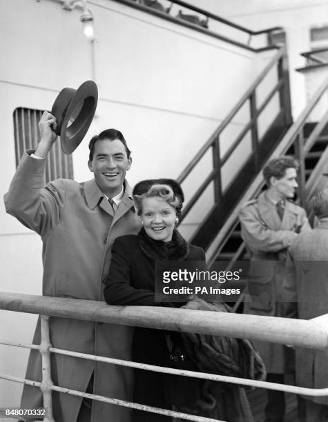 Hollywood film actor Gregory Peck with his wife on their arrival at Southampton aboard the Cunard-White Star liner 'Queen Elizabeth'. He has come to...