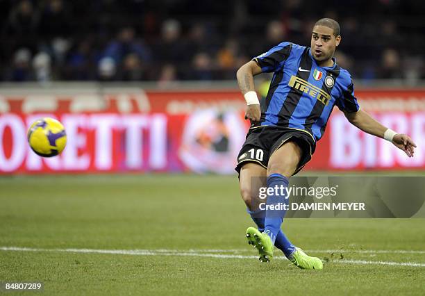 Inter Milan's Brazilian forward Adriano kicks the ball during their Italian Serie A match against AC Milan at San Siro Stadium in Milan, on February...