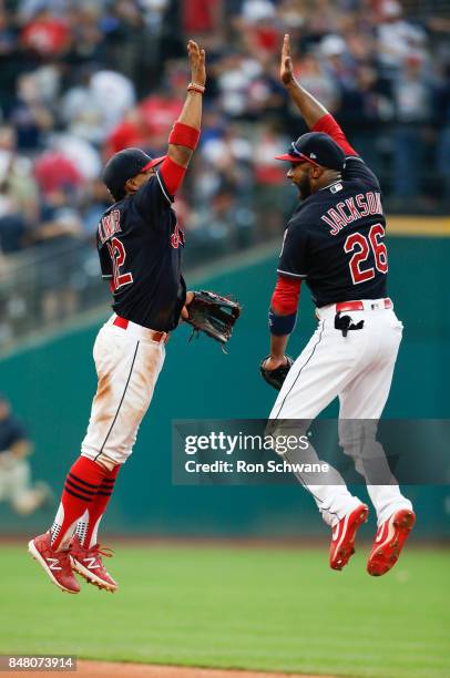 Francisco Lindor and Austin Jackson of the Cleveland Indians celebrate an 8-4 victory over the Kansas City Royals at Progressive Field on September...