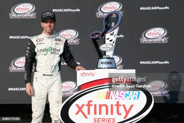 Blake Koch, driver of the LeafFilter Gutter Protection Chevrolet, poses for a photo opportunity following the NASCAR XFINITY Series TheHouse.com 300...