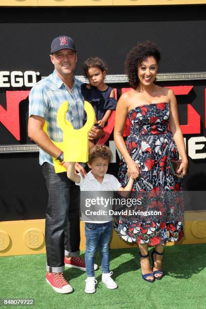 Adam Housley, Ariah Talea Housley, Aden John Tanner Housley, and Tamera Mowry at the premiere of Warner Bros. Pictures' "The LEGO Ninjago Movie" at...