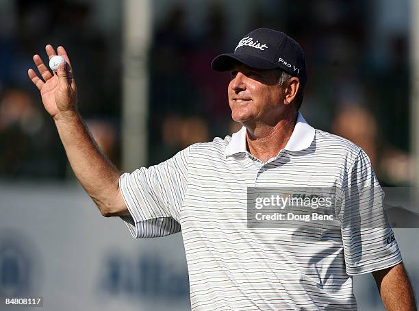 Jay Haas waves to a cheering crowd on the 18th green after the final round of the Allianz Championship at The Old Course at Broken Sound Club on...