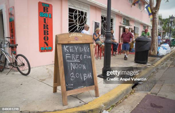 Free food, ice and water are given out in front of a bar on Duval Street on September 16, 2017 in Key West, Florida. Many places in the Keys still...