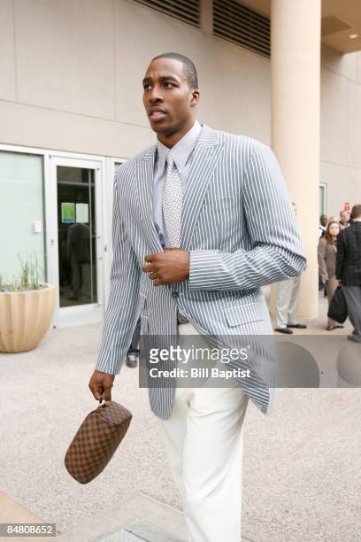 Dwight Howard of the Eastern Conference walks to the team bus en route to the 58th NBA All-Star Game, part of 2009 NBA All-Star Weekend, at US...