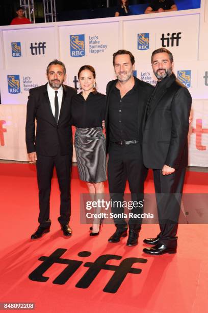 Director Eric Toledano, actress Suzanne Clement, actor Gilles Lellouche and co-director Olivier Nakache attend the "C'est la vie!" premiere during...