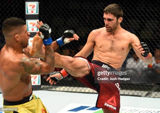 Jason Saggo of Canada lands a front kick to the face of Gilbert Burns of Brasil in their lightweight bout during the UFC Fight Night event inside the...