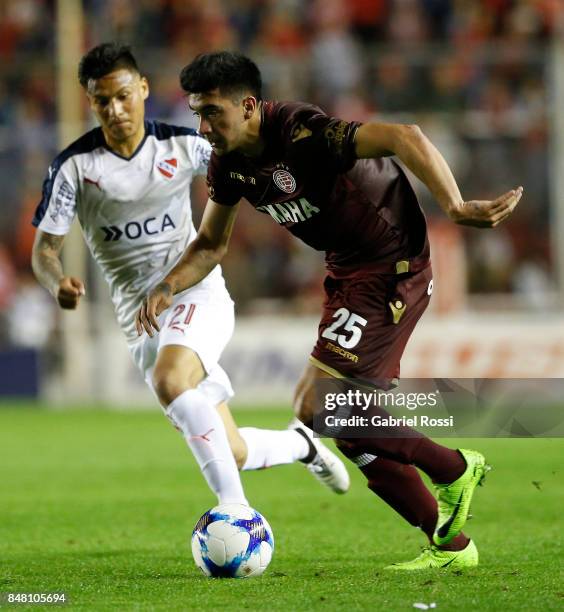 Marcelino Moreno of Lanus drives the ball during a match between Independiente and Lanus as part of the Superliga 2017/18 at Libertadores de America...