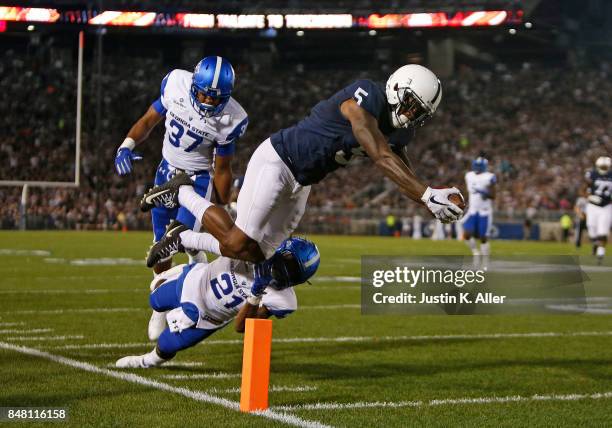 DaeSean Hamilton of the Penn State Nittany Lions dives for the end-zone scoring a 27 yard touchdown in the first half against Antreal Allen and...