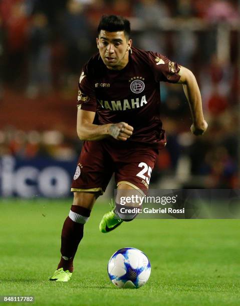 Marcelino Moreno of Lanus drives the ball during a match between Independiente and Lanus as part of the Superliga 2017/18 at Libertadores de America...