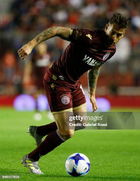 German Denis of Lanus drives the ball during a match between Independiente and Lanus as part of the Superliga 2017/18 at Libertadores de America...