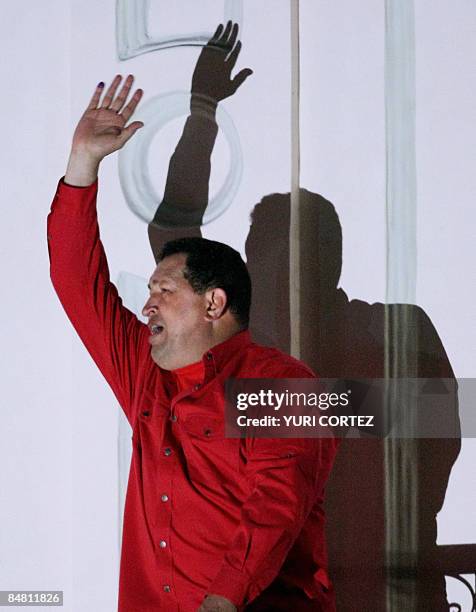 Venezuela's President Hugo Chavez celebrates his victory from the balcony of the Presidencial palace in a referendum on constitutional changes would...