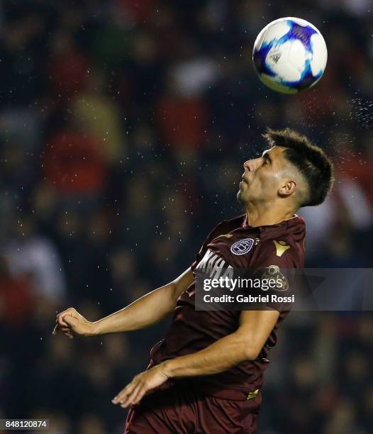 Leonel Di Placido of Lanus heads the ball during a match between Independiente and Lanus as part of the Superliga 2017/18 at Libertadores de America...