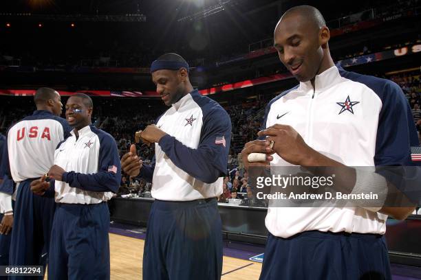Kobe Bryant, LeBron James and Dwyane Wade receive a ring for being members of the USA Men's Basketball team which won the Gold Medal at the 2008...