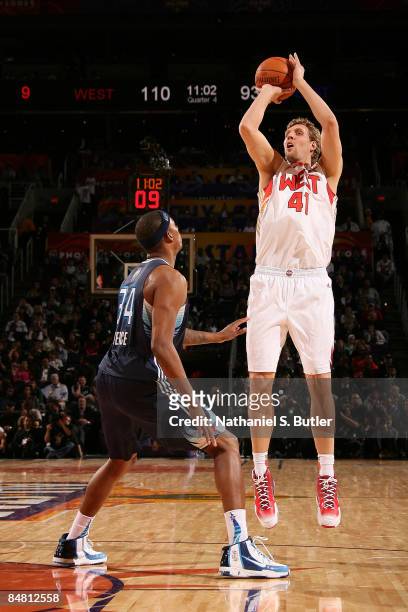 Dirk Nowitzki of the Western Conference attempts a shot against Paul Pierce of the Eastern Conference during the 58th NBA All-Star Game, part of 2009...