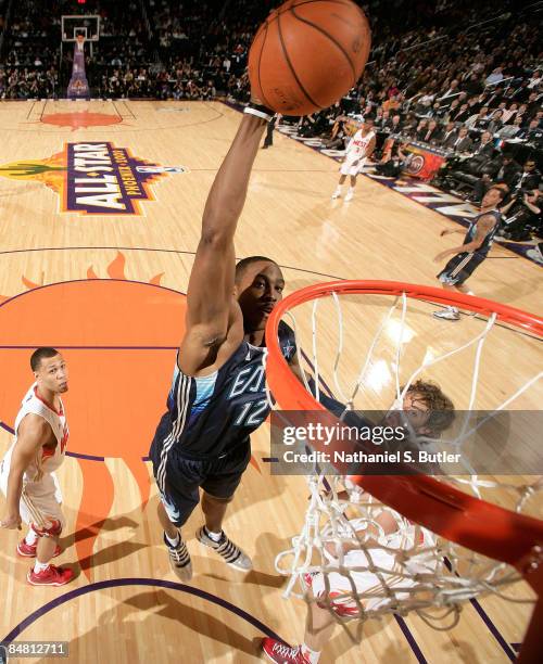 Dwight Howard of the Eastern Conference attempts a shot against Pau Gasol of the Western Conference during the 58th NBA All-Star Game, part of 2009...