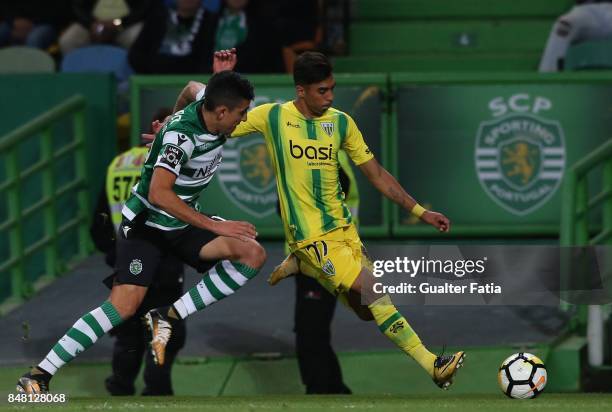 Tondela forward Murilo from Brazil with Sporting CP midfielder Rodrigo Battaglia from Argentina in action during the Primeira Liga match between...