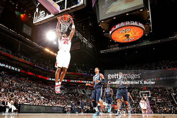Kobe Bryant of the Western Conference dunks against the Eastern Conference during the 58th NBA All-Star Game, part of 2009 NBA All-Star Weekend, at...