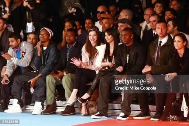 Lupe Fiasco, Kanye West, Milla Jovovich, Kim Kardashian and Reggie Bush attend Y-3 Fall 2009 during Mercedes-Benz Fashion Week at Pier 40 - West...
