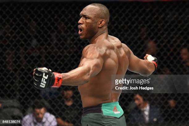 Kamaru Usman of Nigeria celebrates after knocking out Sergio Moraes of Brasil in their welterweight bout during the UFC Fight Night event inside the...