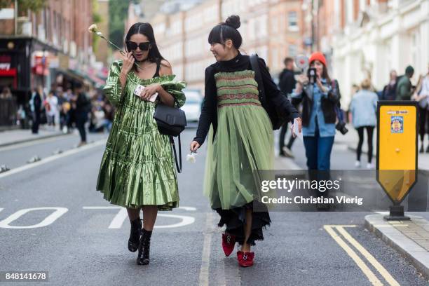 Tina Leung and Susie Lau outside JW Anderson during London Fashion Week September 2017 on September 16, 2017 in London, England.