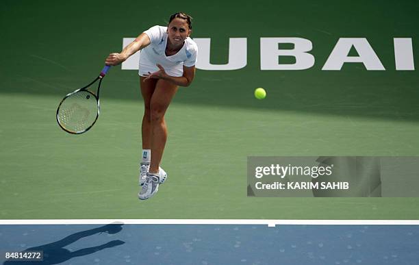 Germany's Julia Schruff returns the ball to Petra Kvitova of the Czech Republic during their singles tennis match on the first day of the WTA Dubai...