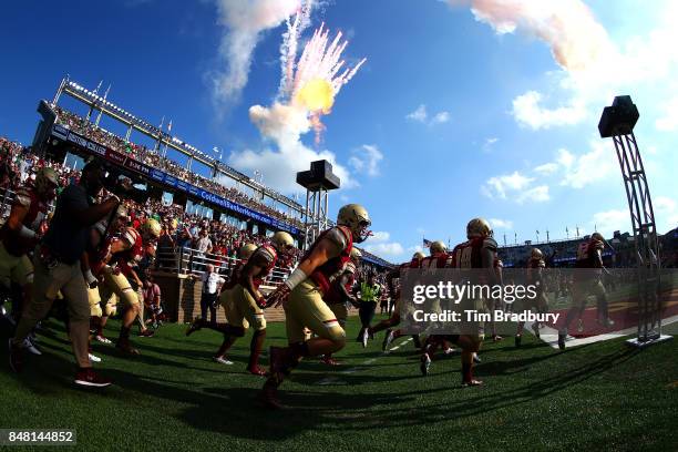 The Boston College Eagles run onto the field prior to the game against the Notre Dame Fighting Irish at Alumni Stadium on September 16, 2017 in...
