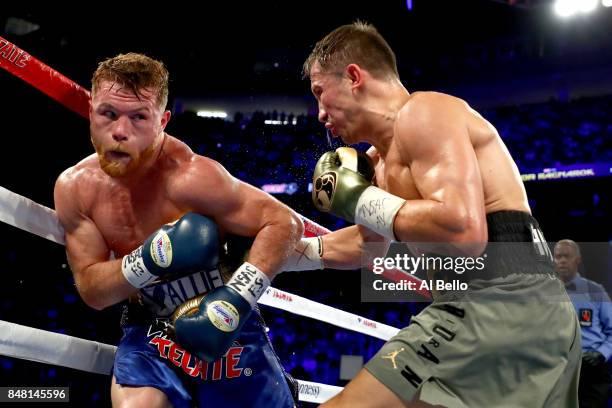 Gennady Golovkin throws a punch at Canelo Alvarez during their WBC, WBA and IBF middleweight championship bout at T-Mobile Arena on September 16,...