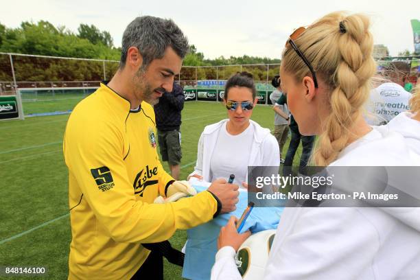 European Legends goalkeeper Victor Baia signs autographs