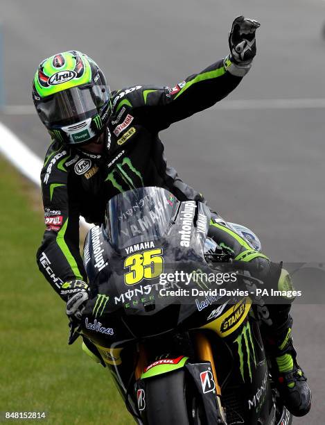 Great Britain's Cal Crutchlow acknowledges the crowd after the British round of Moto GP at Silverstone Circuit, Northamptonshire.