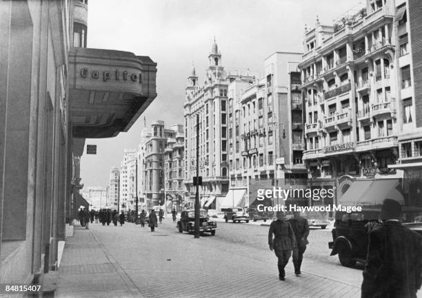 The Avenida Jose Antonio in Madrid, , with the Capitol Cinema on the left and the Hotel Excelsior on the right, 1946. Original Publication : Picture...