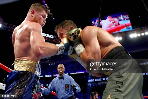 Canelo Alvarez throws a punch at Gennady Golovkin during their WBC, WBA and IBF middleweight championship bout at T-Mobile Arena on September 16,...