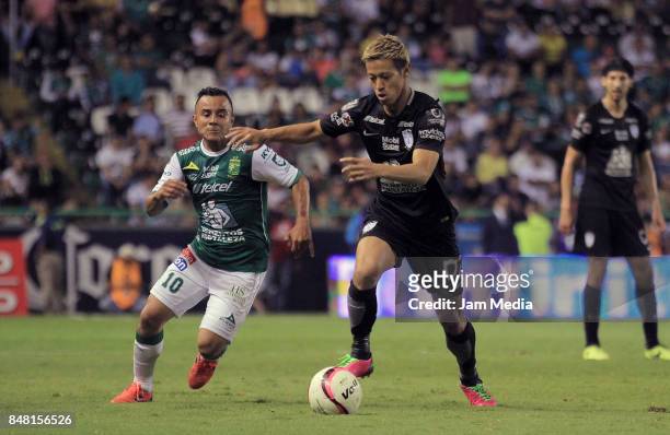 Keisuke Honda of Pachuca fights for the ball with Luis Montes of Leon during the 9th round match between Leon and Pachuca as part of the Torneo...
