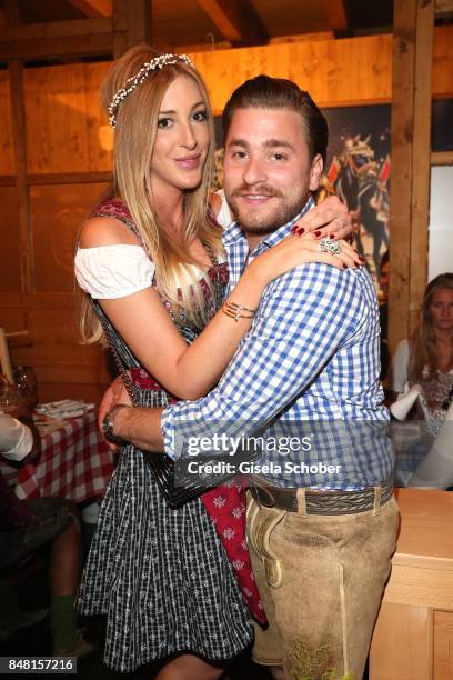 Singer Sebastian Buergin "Baschi" and his girlfriend Alana Netzer, daughter of Guenter and Elvira Netzer during the opening of the Oktoberfest 2017...