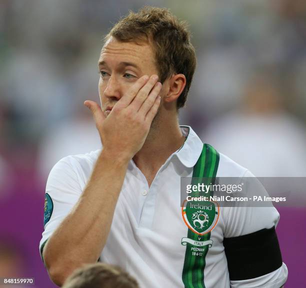 Aiden Mcgeady is seen wearing a black arm band drawing attention to the Loughinisland atrocity during the UEFA Euro 2012 Group match at the Municipal...