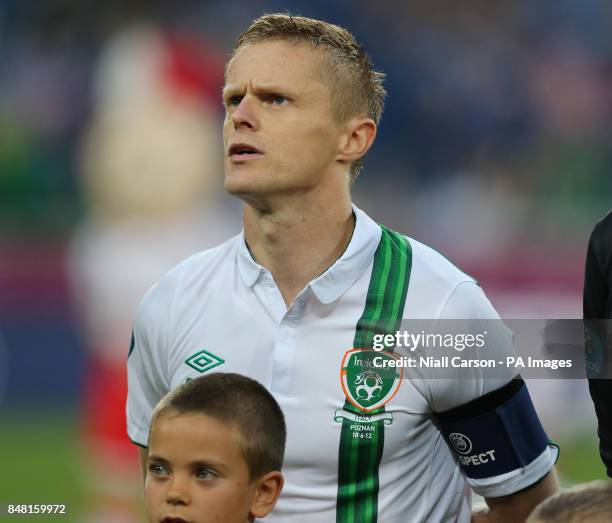 Ireland Captain Damien Duff is seen wearing a black arm band drawing attention to the Loughinisland atrocity during the UEFA Euro 2012 Group match at...