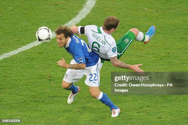 Italy's Alessandro Diamanti and Republic of Ireland's Glenn Whelan battle for the ball