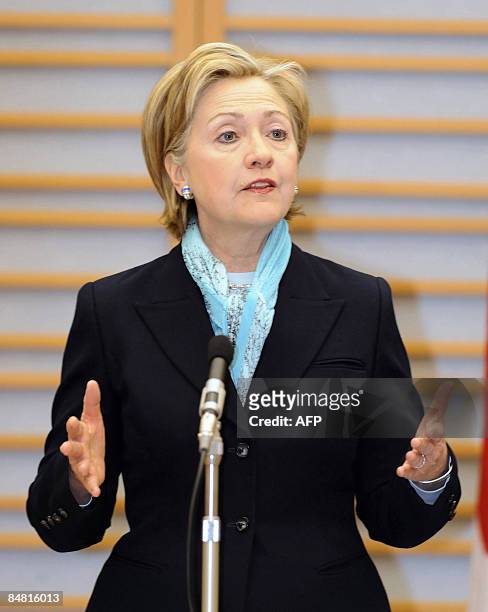 Secretary of State Hillary Clinton gestures during her speech upon her arrival at Haneda international airport in Tokyo on February 16, 2009. Clinton...