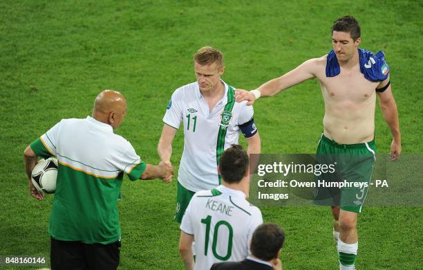 Republic of Ireland's Stephen Ward and Damien Duff look dejected after the final whistle