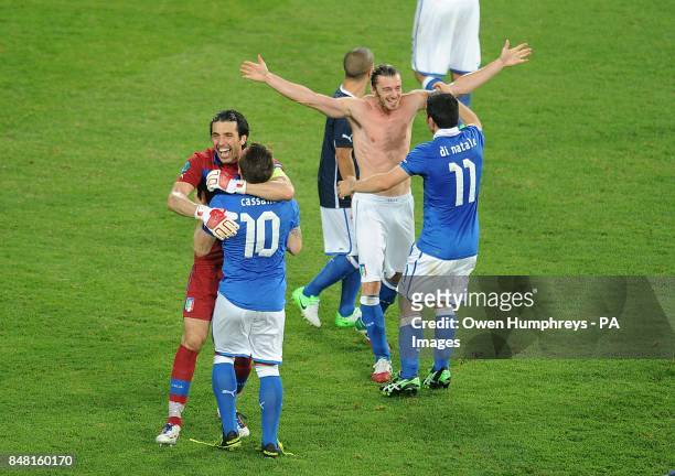 **Alternative Crop** Italy goalkeeper Gianluigi Buffon and Antonio Cassano celebrate with their team mates after the final whistle