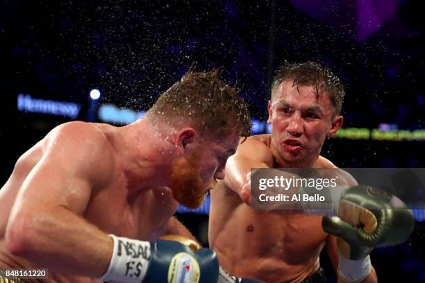 Gennady Golovkin throws a punch at Canelo Alvarez during their WBC, WBA and IBF middleweight championship bout at T-Mobile Arena on September 16,...