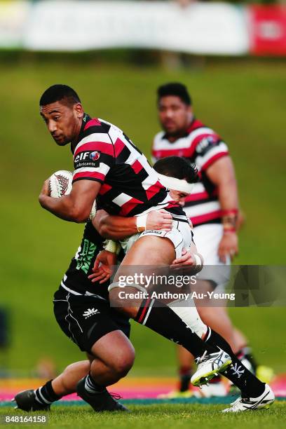 Jimmy Tupou of Counties Manukau is tackled during the round five Mitre 10 Cup match between Counties Manukau and Hawke's Bay at ECOLight Stadium on...