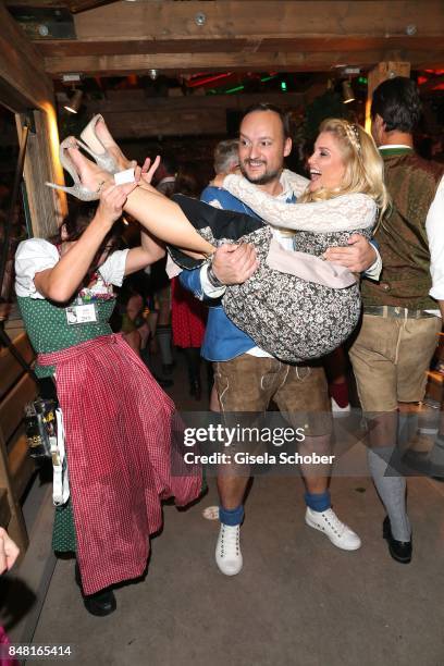 Jennifer Knaeble and her fiancee Felix Moese during the opening of the Oktoberfest 2017 at Kaeferschaenke at Theresienwiese on September 16, 2017 in...